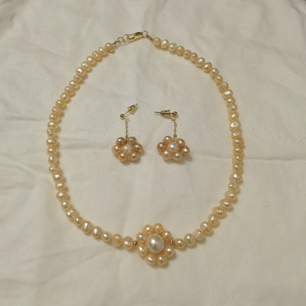 Natural freshwater pearl necklace and earrings set.